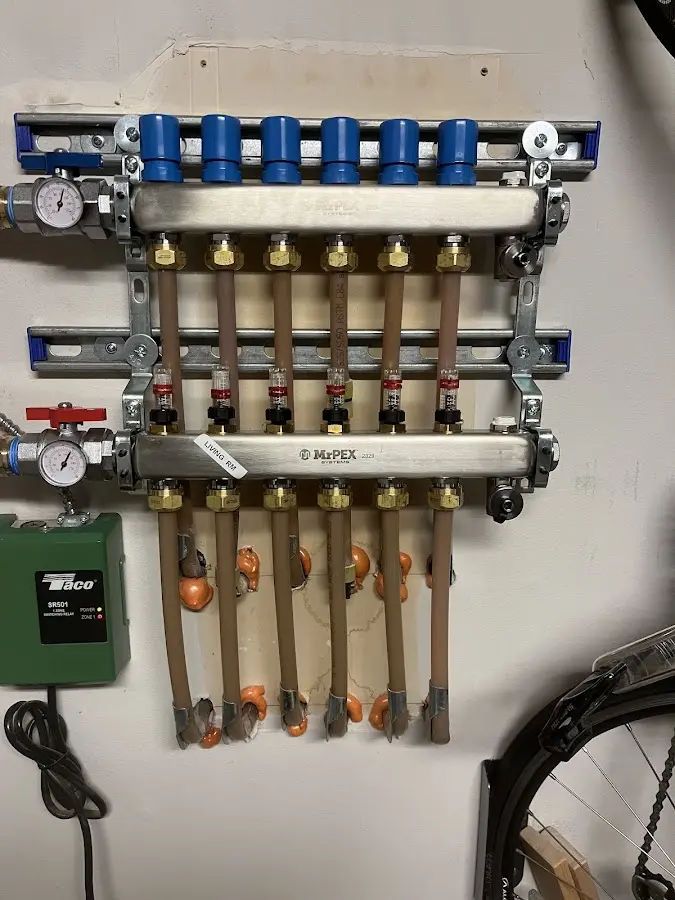 Plumber performing Water Heater Repair at a residential property in West Orange